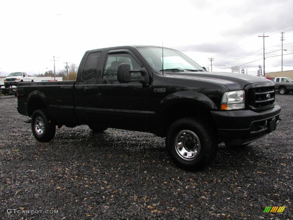 2002 F250 Super Duty XLT SuperCab 4x4 - Black / Medium Flint photo #19