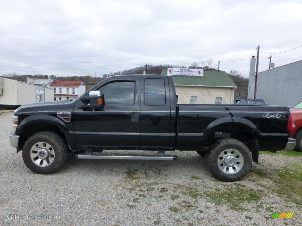 Black Clearcoat 2009 Ford F350 Super Duty Lariat SuperCab 4x4 Exterior Photo #73153704