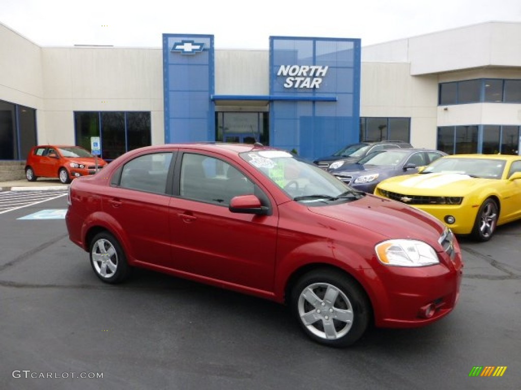 2010 Aveo LT Sedan - Sport Red / Charcoal photo #1
