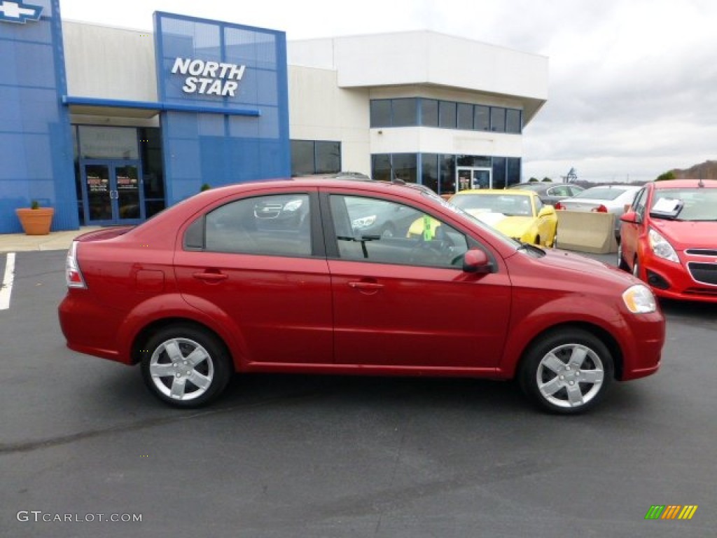 2010 Aveo LT Sedan - Sport Red / Charcoal photo #2