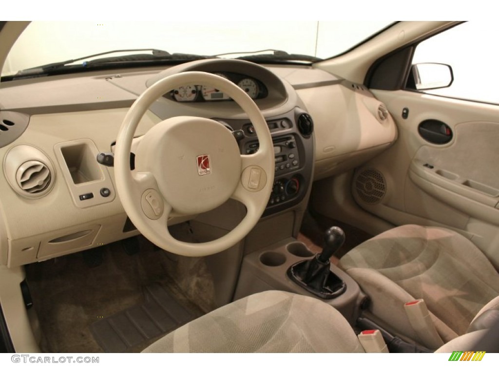 Tan Interior 2003 Saturn ION 3 Sedan Photo #73175489