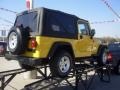 2006 Solar Yellow Jeep Wrangler Unlimited 4x4  photo #33