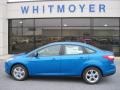 2013 Blue Candy Ford Focus SE Sedan  photo #1