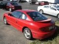 2003 Victory Red Pontiac Sunfire   photo #4