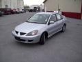 Cool Silver Metallic 2005 Mitsubishi Lancer OZ Rally