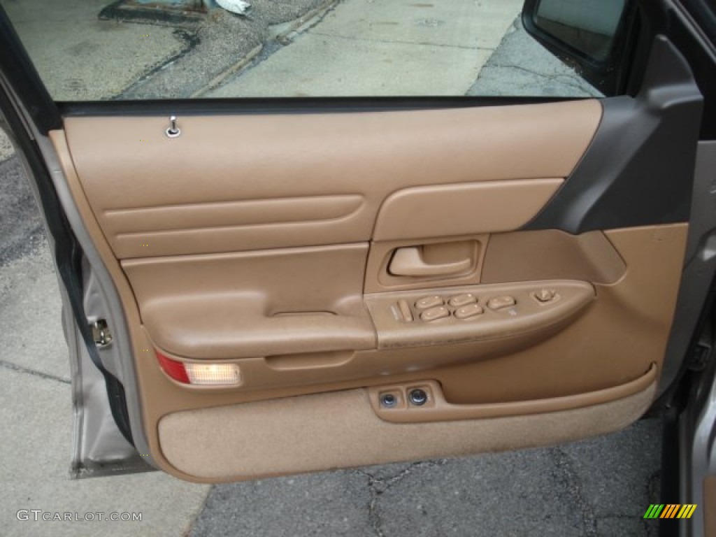 1995 Ford Crown Victoria Standard Crown Victoria Model Tan Door Panel Photo #73299713