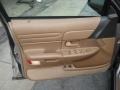 Tan 1995 Ford Crown Victoria Standard Crown Victoria Model Door Panel