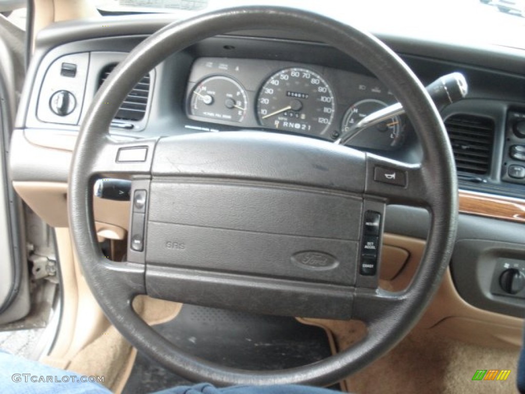 1995 Ford Crown Victoria Standard Crown Victoria Model Tan Steering Wheel Photo #73299837