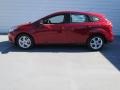 2013 Ruby Red Ford Focus SE Hatchback  photo #5