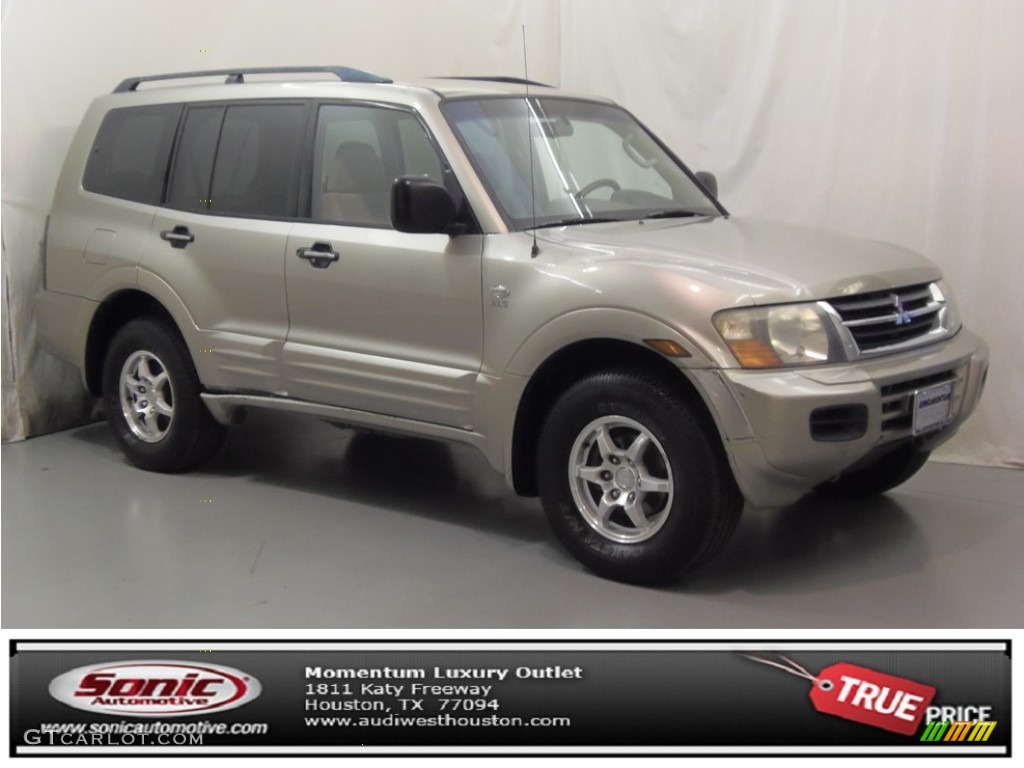 2002 Montero XLS 4x4 - Sudan Beige Metallic / Tan photo #1