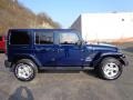 2013 True Blue Pearl Jeep Wrangler Unlimited Sahara 4x4  photo #6