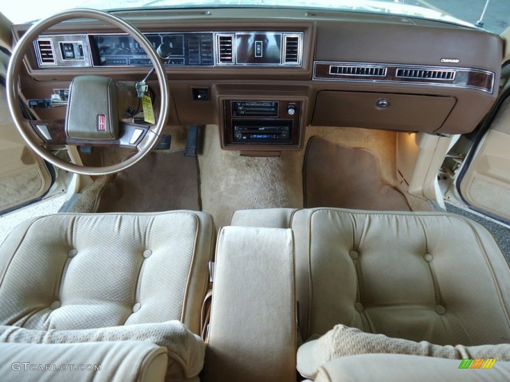 1985 Oldsmobile Cutlass Supreme Brougham Coupe Beige Dashboard Photo #73415332