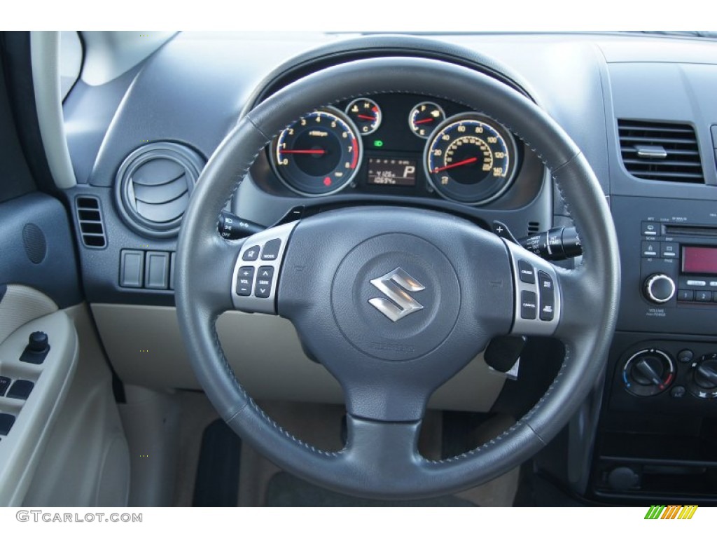2011 Suzuki SX4 Sedan LE Beige Steering Wheel Photo #73476368