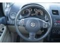 2011 Suzuki SX4 Beige Interior Steering Wheel Photo