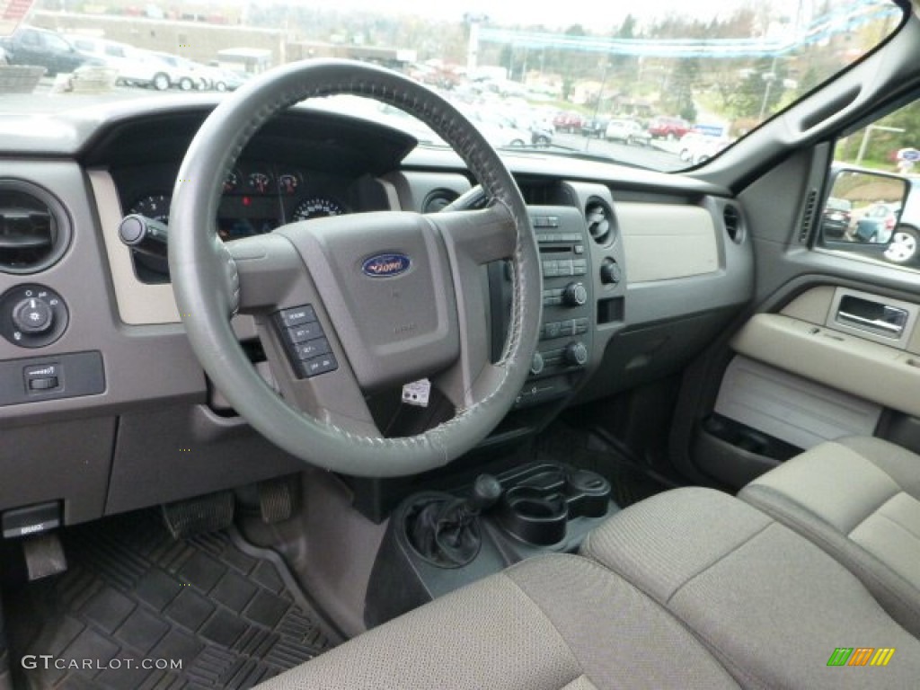 2010 F150 STX Regular Cab 4x4 - Tuxedo Black / Medium Stone photo #9