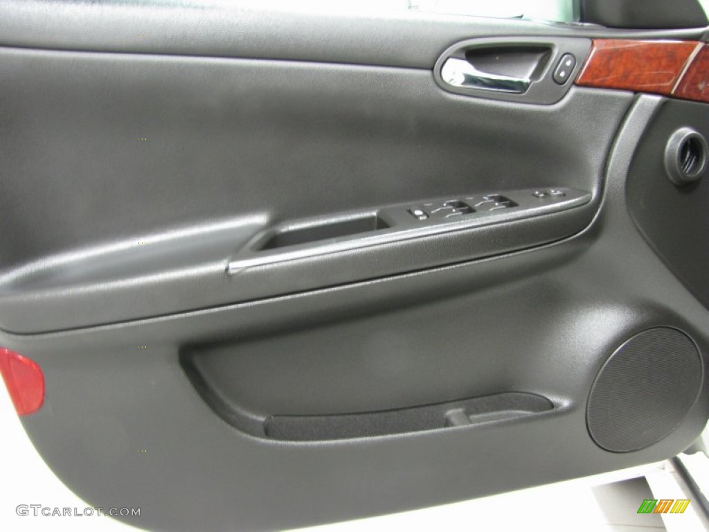 2009 Chevrolet Impala LT Ebony Door Panel Photo #73549226