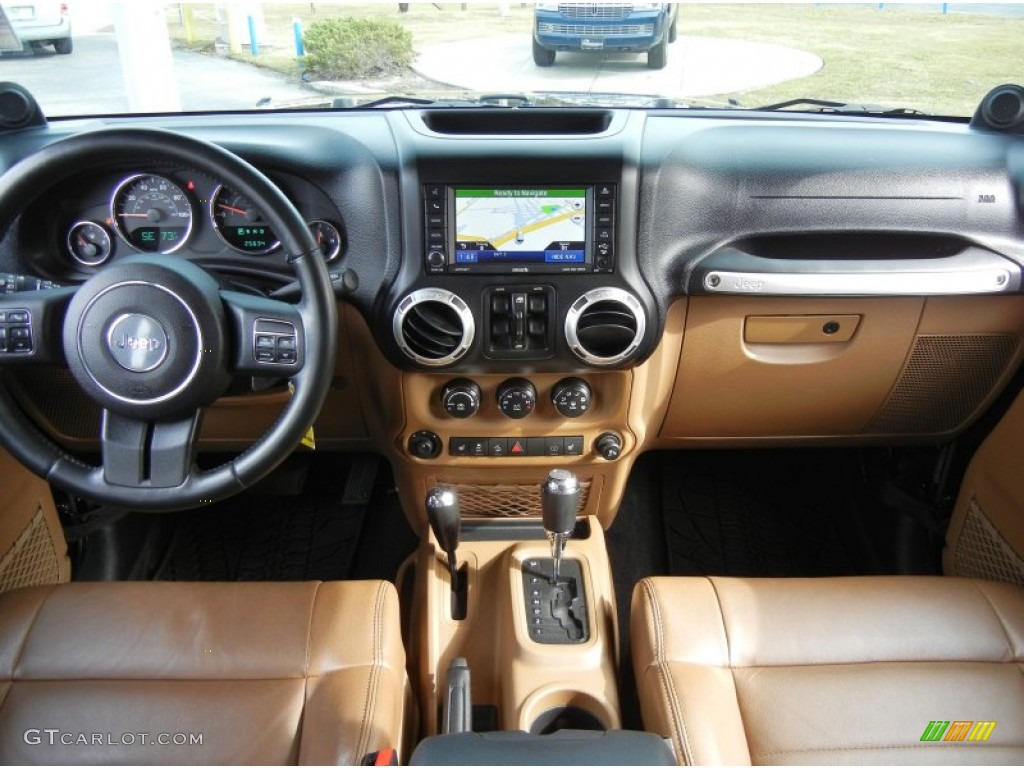 2011 Jeep Wrangler Unlimited Sahara 4x4 Black/Dark Saddle Dashboard Photo #73553156