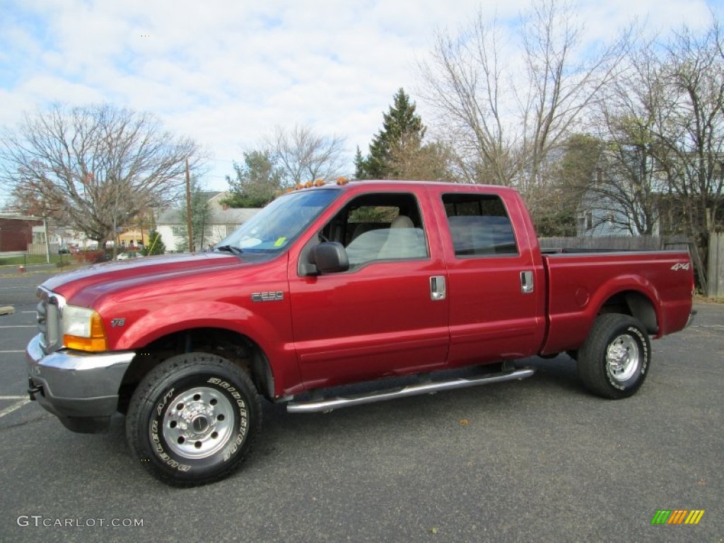 2001 F250 Super Duty XLT Super Crew 4x4 - Toreador Red Metallic / Medium Graphite photo #1