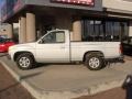 Platinum Gold Metallic - Hardbody Truck XE Regular Cab Photo No. 6