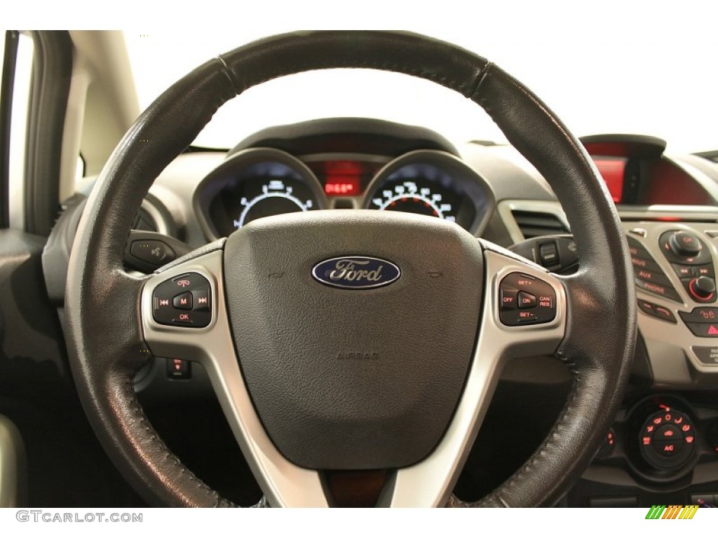 2011 Ford Fiesta SEL Sedan Charcoal Black/Blue Cloth Steering Wheel Photo #73582574