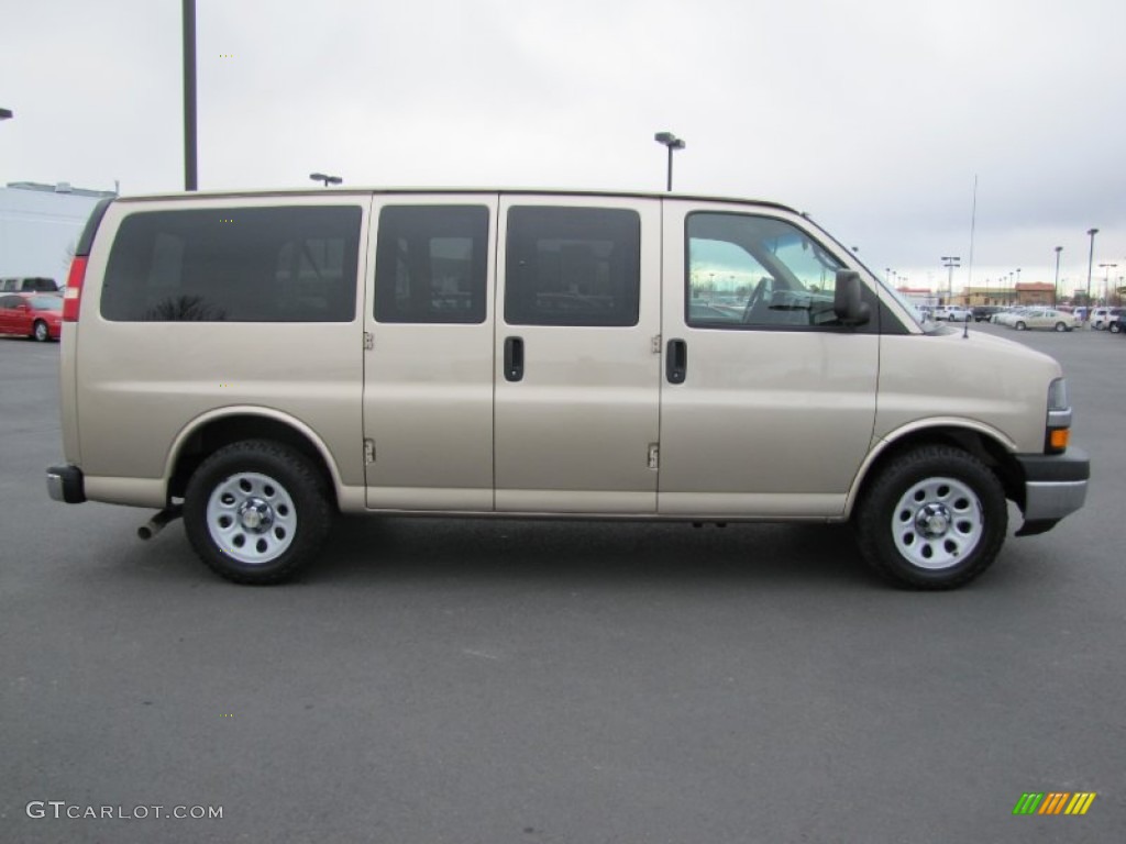 Sandstone Metallic 2009 Chevrolet Express LS 1500 AWD Passenger Van Exterior Photo #73591690