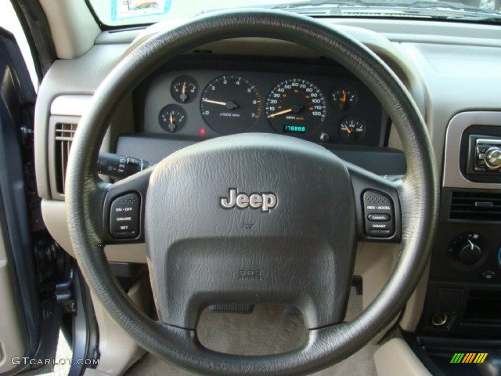 2004 Jeep Grand Cherokee Laredo 4x4 Sandstone Steering Wheel Photo #73599926