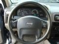 2004 Jeep Grand Cherokee Sandstone Interior Steering Wheel Photo