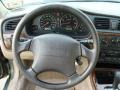 Beige 2003 Subaru Outback Wagon Steering Wheel