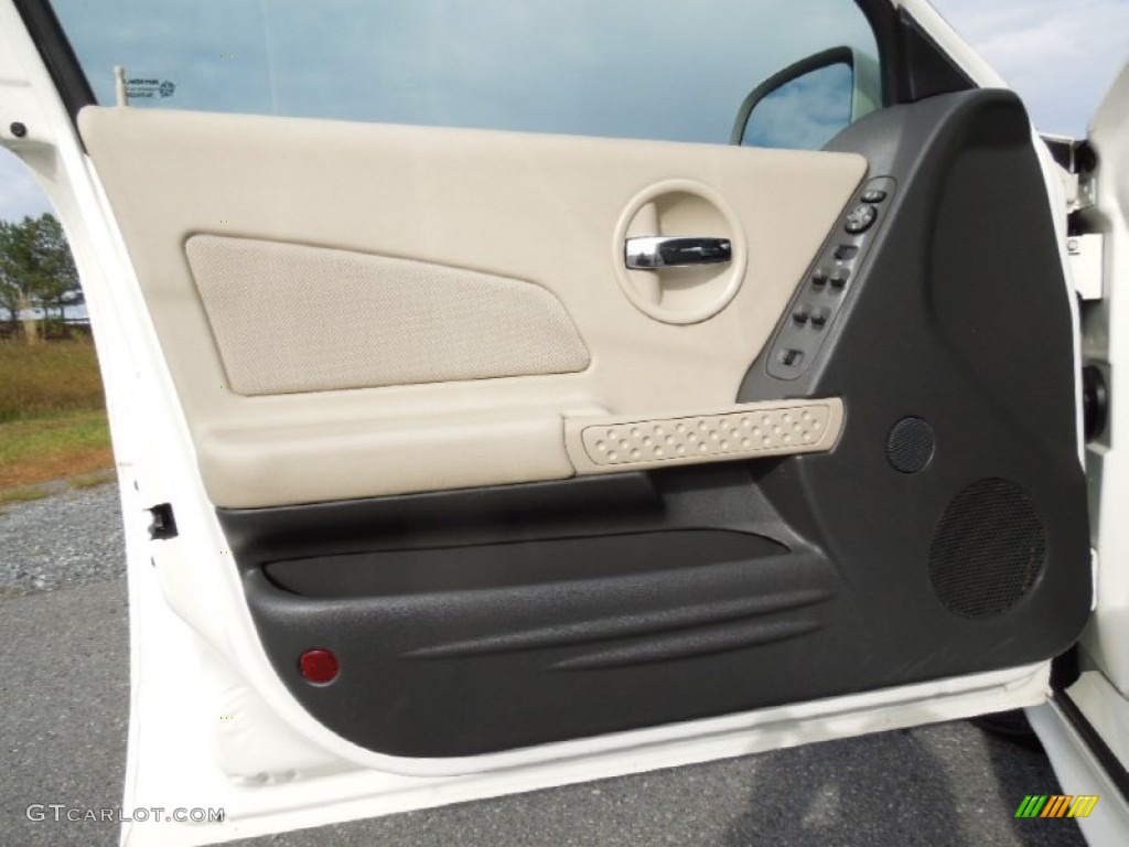 2005 Pontiac Grand Prix Sedan Parchment/Dark Pewter Door Panel Photo #73631834