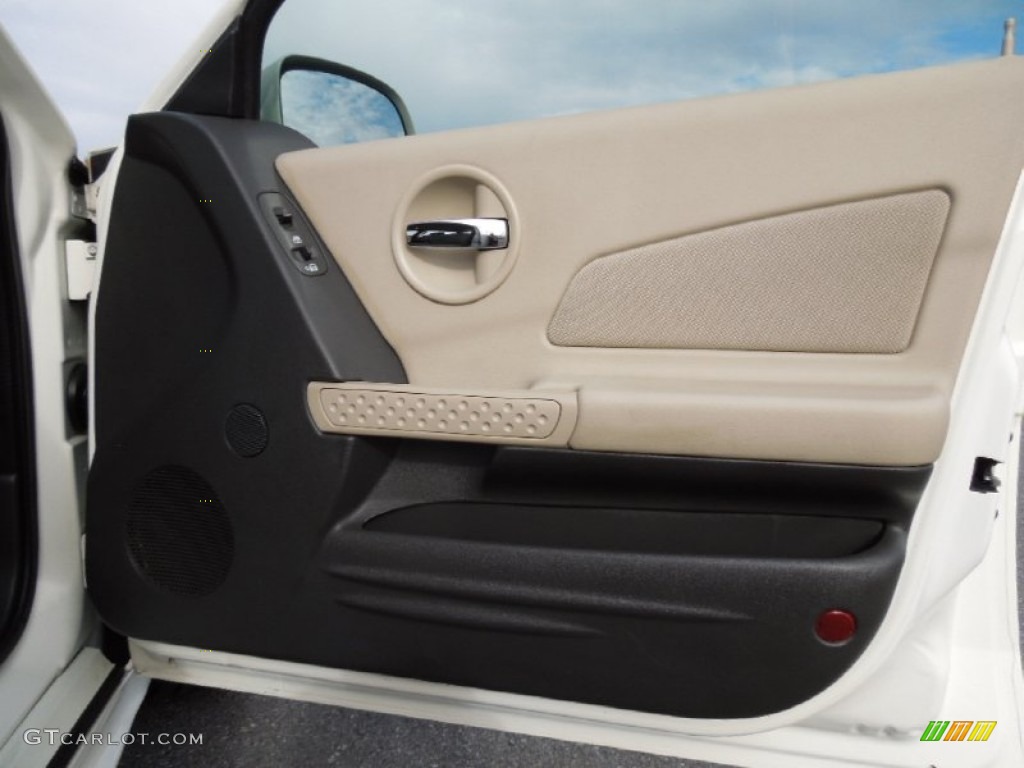 2005 Pontiac Grand Prix Sedan Parchment/Dark Pewter Door Panel Photo #73631915