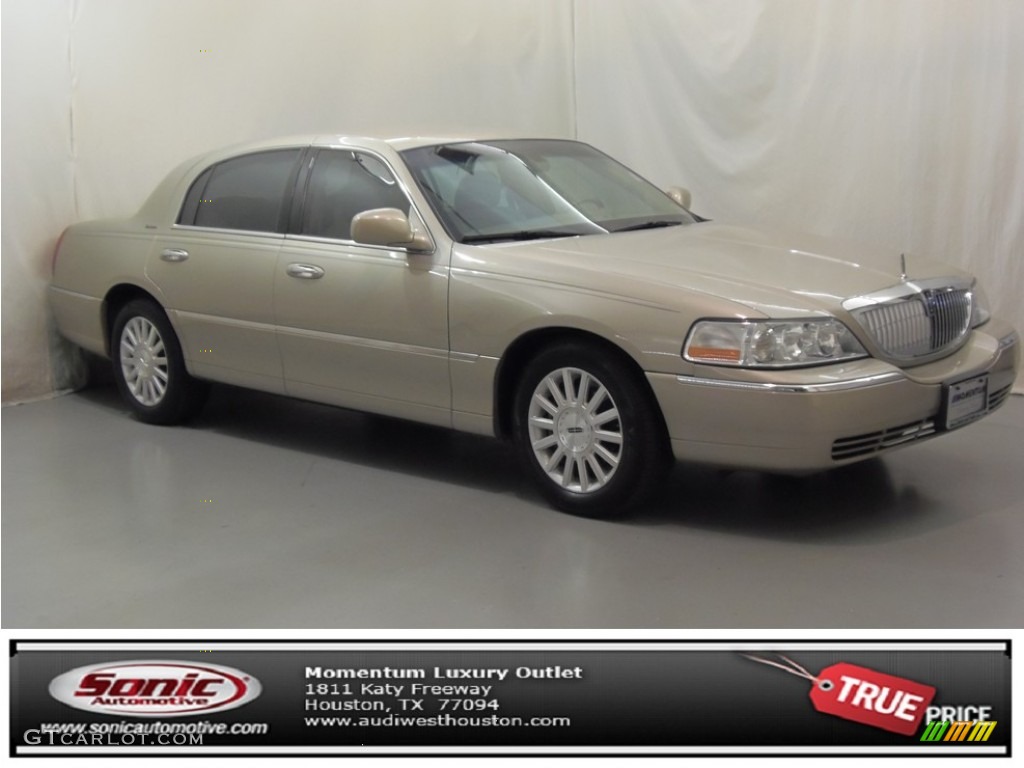 Pueblo Gold Metallic Lincoln Town Car