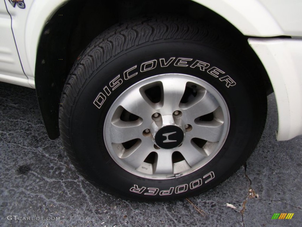 1999 Honda Passport LX Wheel Photo #73678232