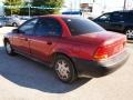 1997 Medium Red Saturn S Series SL1 Sedan  photo #3