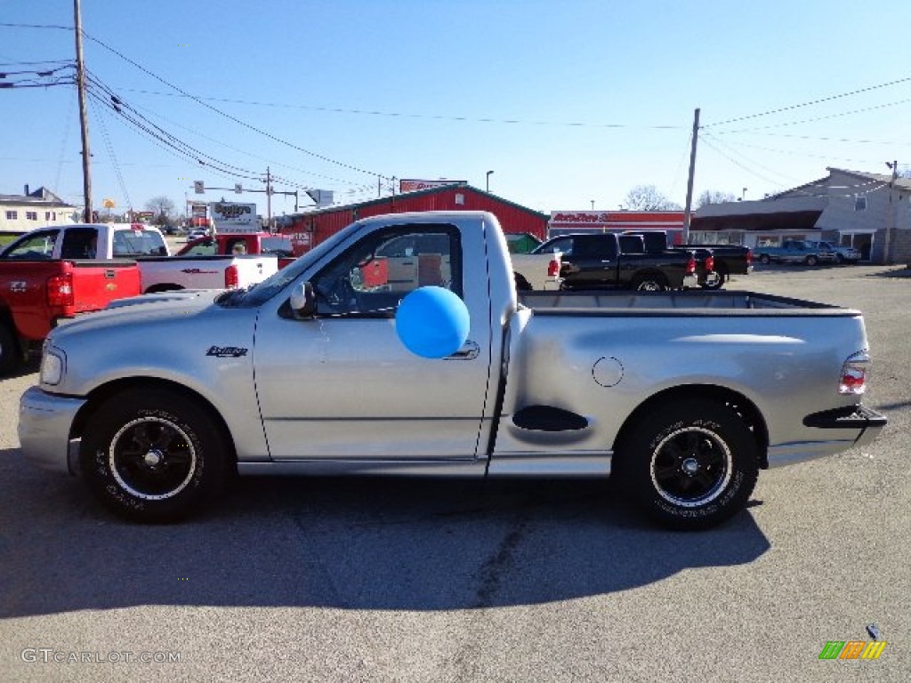 Silver Metallic 2002 Ford F150 SVT Lightning Exterior Photo #73710866