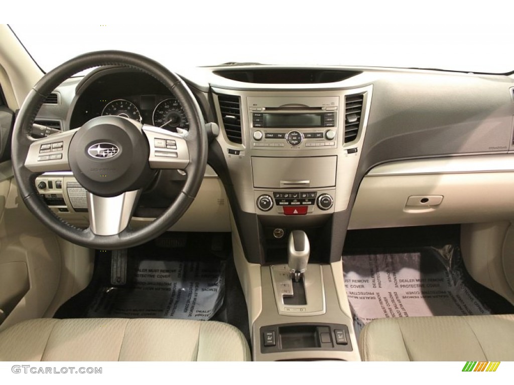 2010 Subaru Outback 2.5i Premium Wagon Warm Ivory Dashboard Photo #73719260