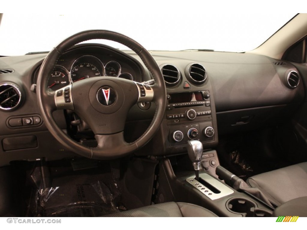 2010 Pontiac G6 GT Sedan Ebony Dashboard Photo #73772276