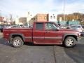 2001 Dark Carmine Red Metallic Chevrolet Silverado 1500 LS Extended Cab 4x4  photo #12