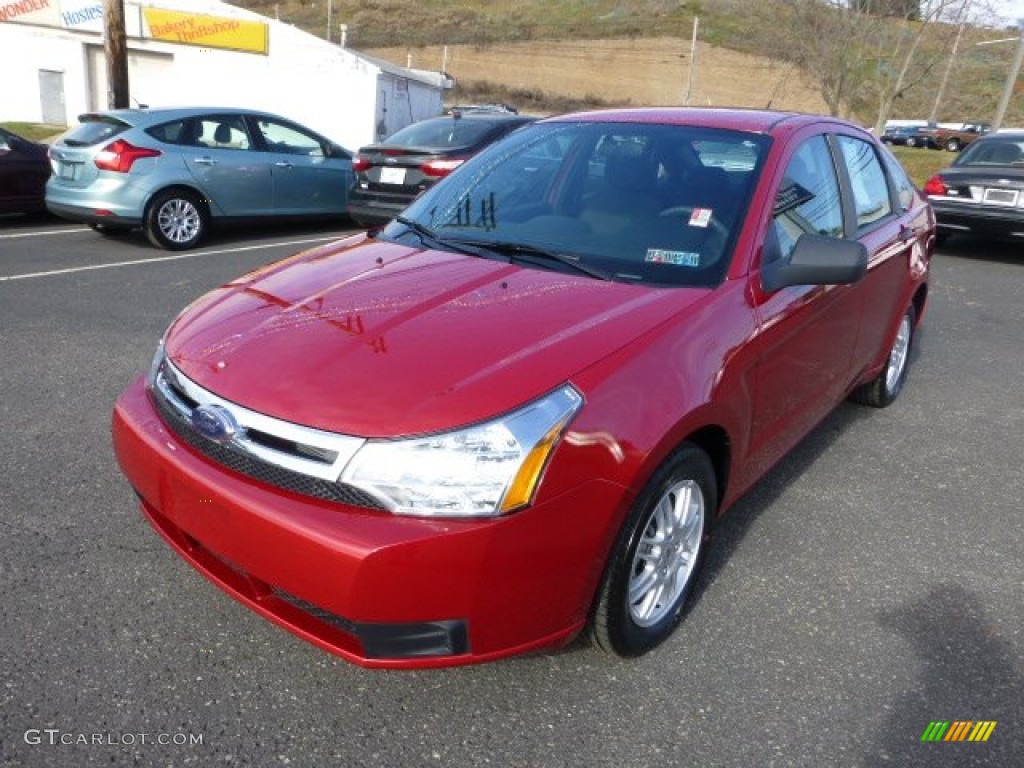 Sangria Red Metallic 2010 Ford Focus SE Sedan Exterior Photo #73778283