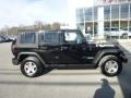 2010 Black Jeep Wrangler Unlimited Islander Edition 4x4  photo #12