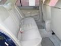 2003 Mitsubishi Lancer Tan Interior Rear Seat Photo