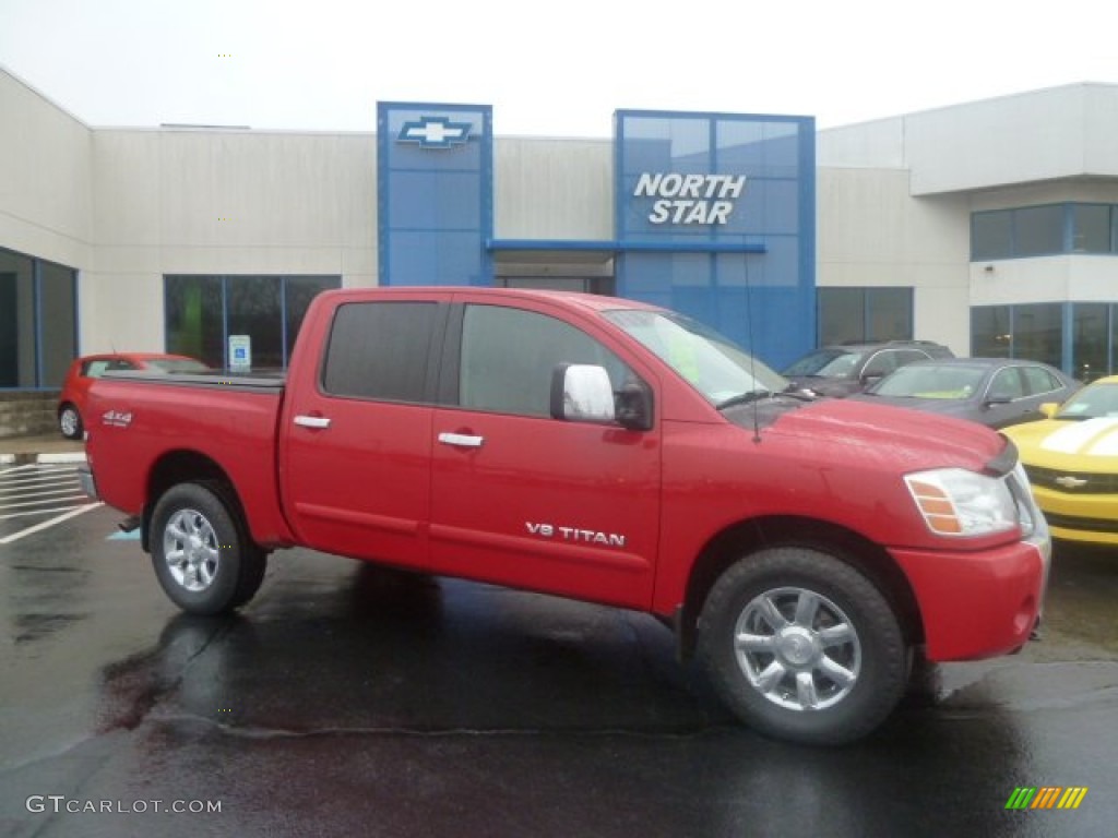 2005 Titan SE Crew Cab 4x4 - Red Alert / Graphite/Titanium photo #1