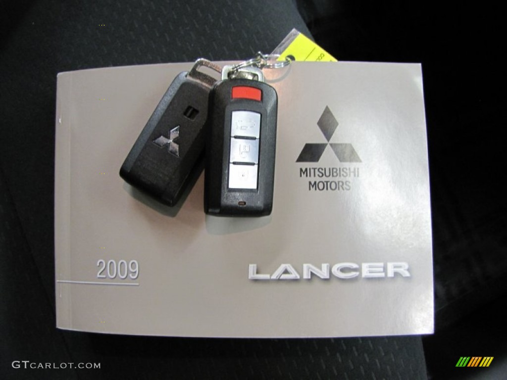 2009 Lancer GTS - Rotor Glow Orange Metallic / Black photo #33