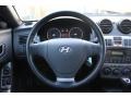 Black Steering Wheel Photo for 2004 Hyundai Tiburon #73860617