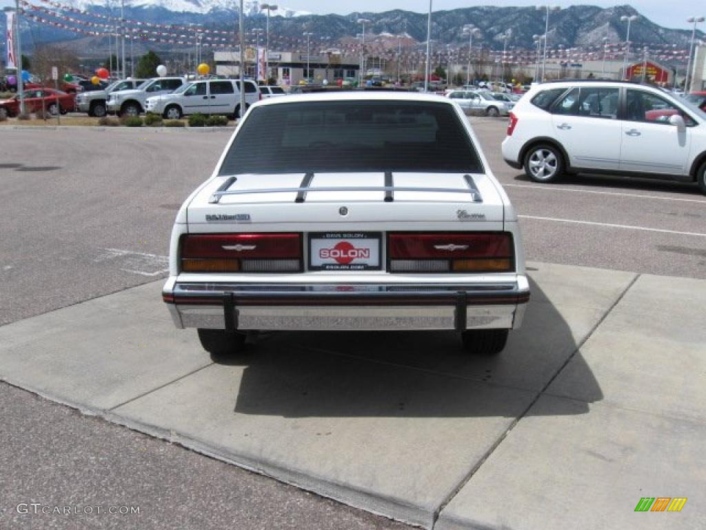 1985 Cimarron Sedan - White / Red photo #5