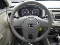 2010 Kia Rio Beige Interior Steering Wheel Photo