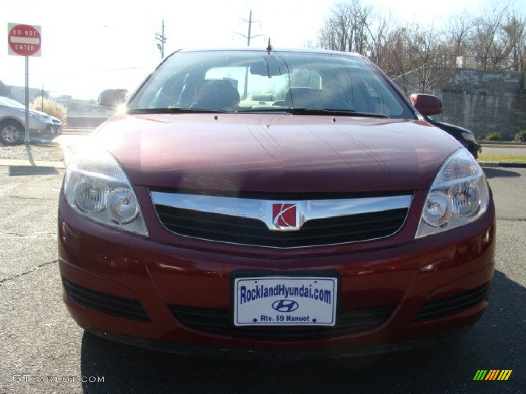 2009 Aura XE - Red Jewel Tintcoat / Tan photo #2