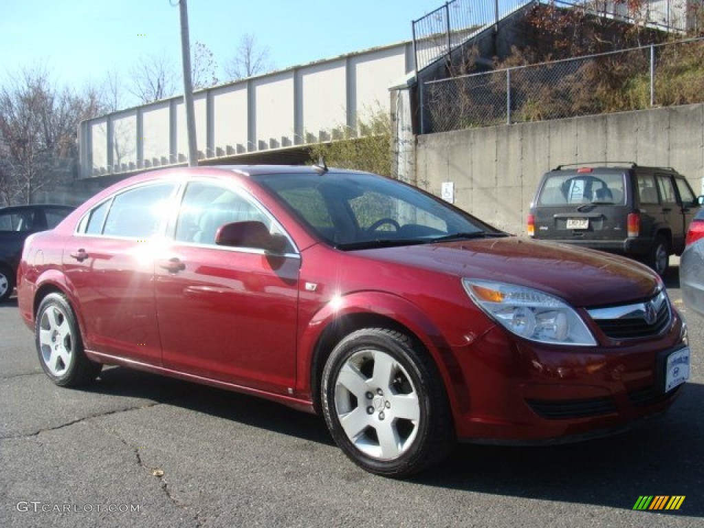 2009 Aura XE - Red Jewel Tintcoat / Tan photo #3
