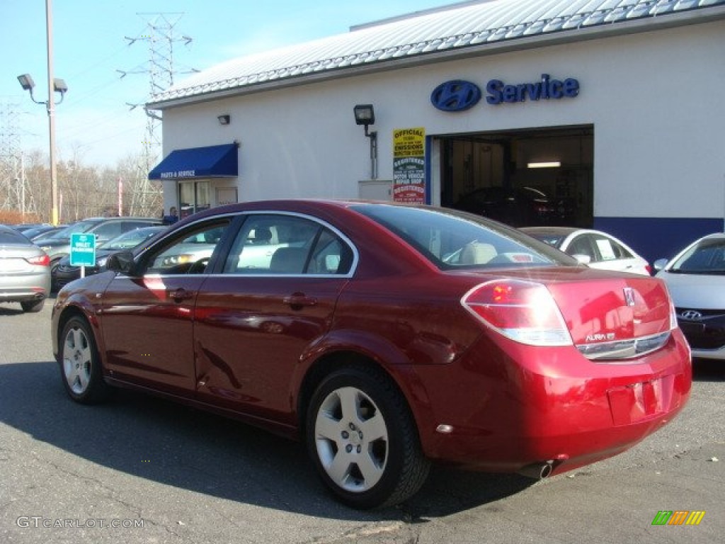 2009 Aura XE - Red Jewel Tintcoat / Tan photo #6