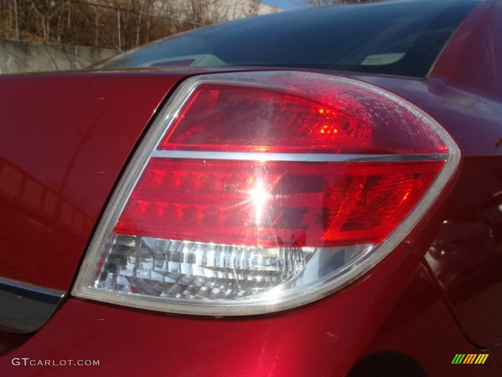 2009 Aura XE - Red Jewel Tintcoat / Tan photo #19