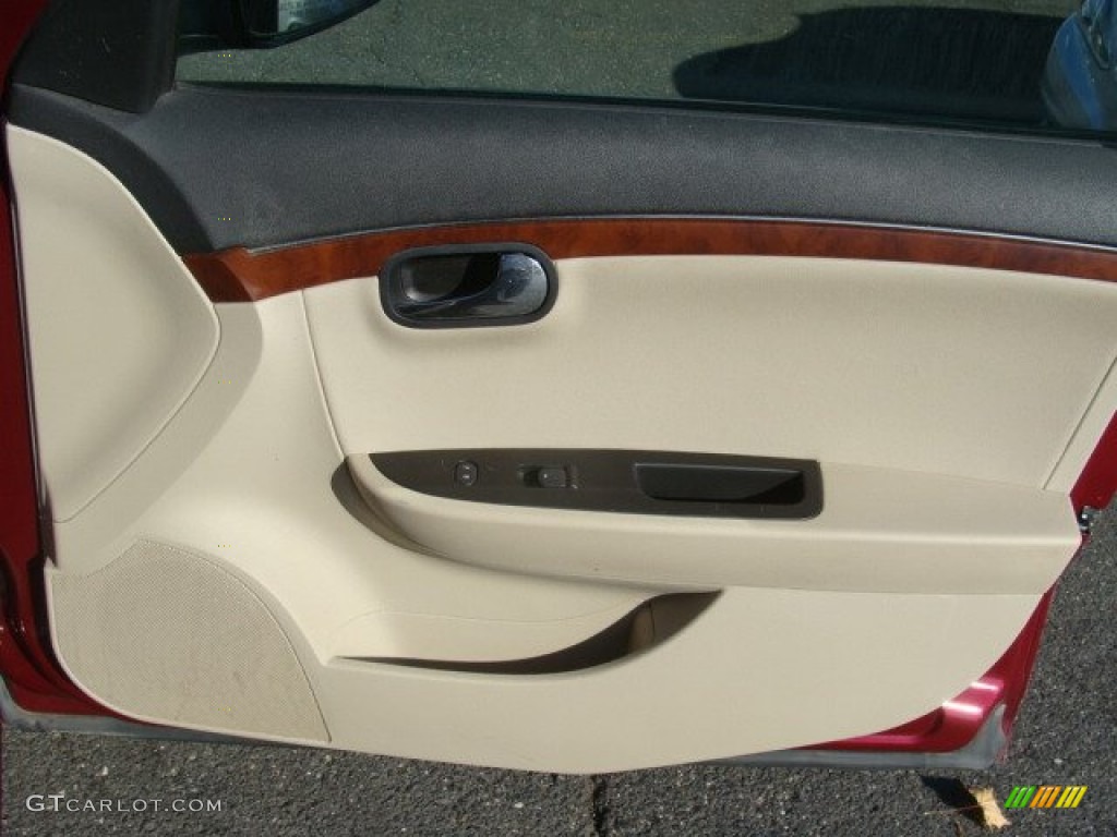 2009 Aura XE - Red Jewel Tintcoat / Tan photo #21